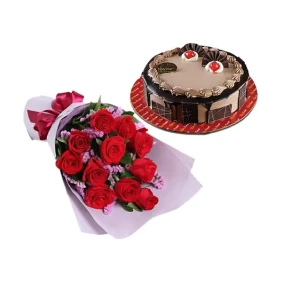 Cake with one dozen red roses in bouquet